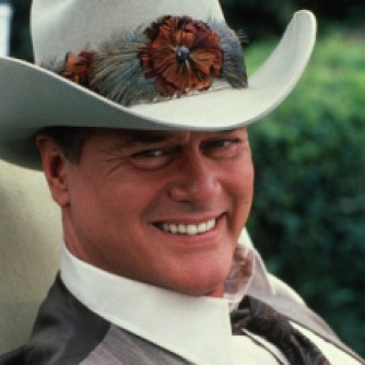 A still from the American television series 'Dallas' shows actor Larry Hagman, who plays John Ross 'J.R.' Ewing Jr., as he sits in a lawnchair dressed in a waistcoat and Stetson, June 1982. (Photo by CBS Photo Archive/Getty Images)