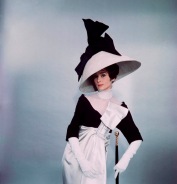 1963: Actress Audrey Hepburn wearing costume with wide lampshade hat topped with bow and holding walking stick, all designed by Cecil Beaton for the Broadway musical 'My Fair Lady'. (Photo by Cecil Beaton)